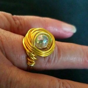 Gold tone wire ring very elegant with earrings. Sold sept these are samples. MTO